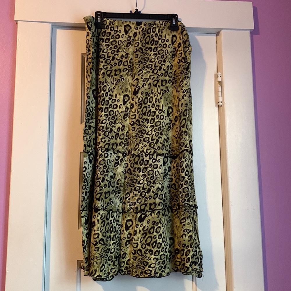 We have a Off colored Green Cheetah Print Skirt.